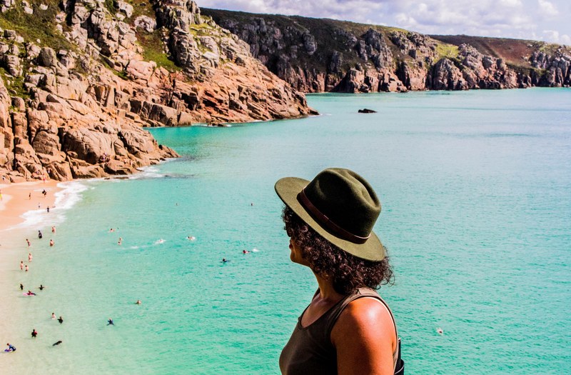 curl woman hat and porthcurno 4k