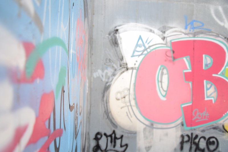 bright graffiti on urban cement wall, graffiti on cement wall 4k