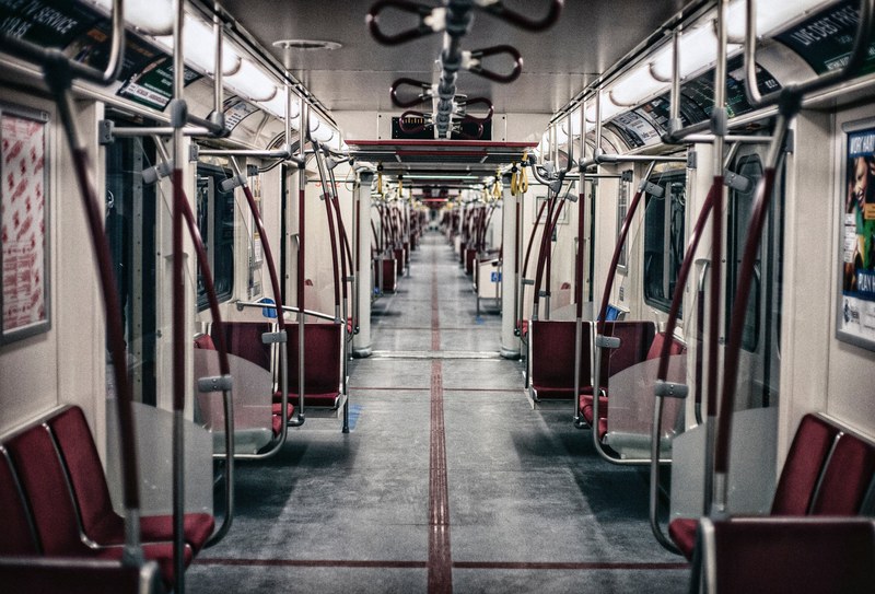view of a long empty subway train interior in toronto, _empty subway train toronto 4k