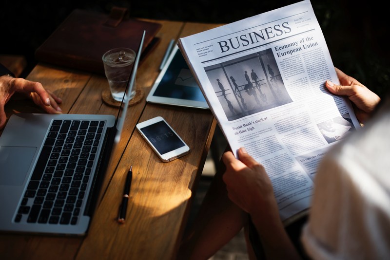 desk office newspaper and laptop 4k