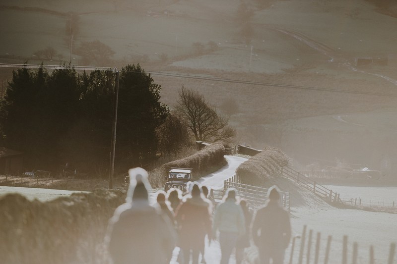 people walking along country lane land rover 4k