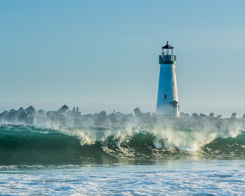 coast lighthouse beacon and breakwater 4k