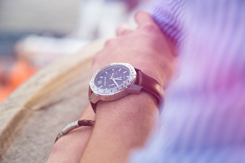 a man dressed in a striped shirt with a fancy expensive watch folding his arms, lean 4k