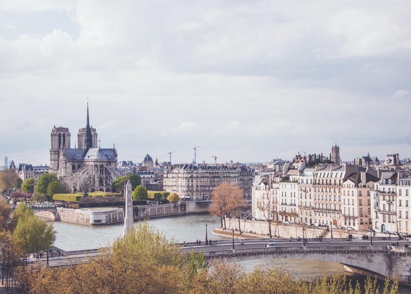 view of the back side of notre dame and the seine river in paris, notre dame and seine river 4k