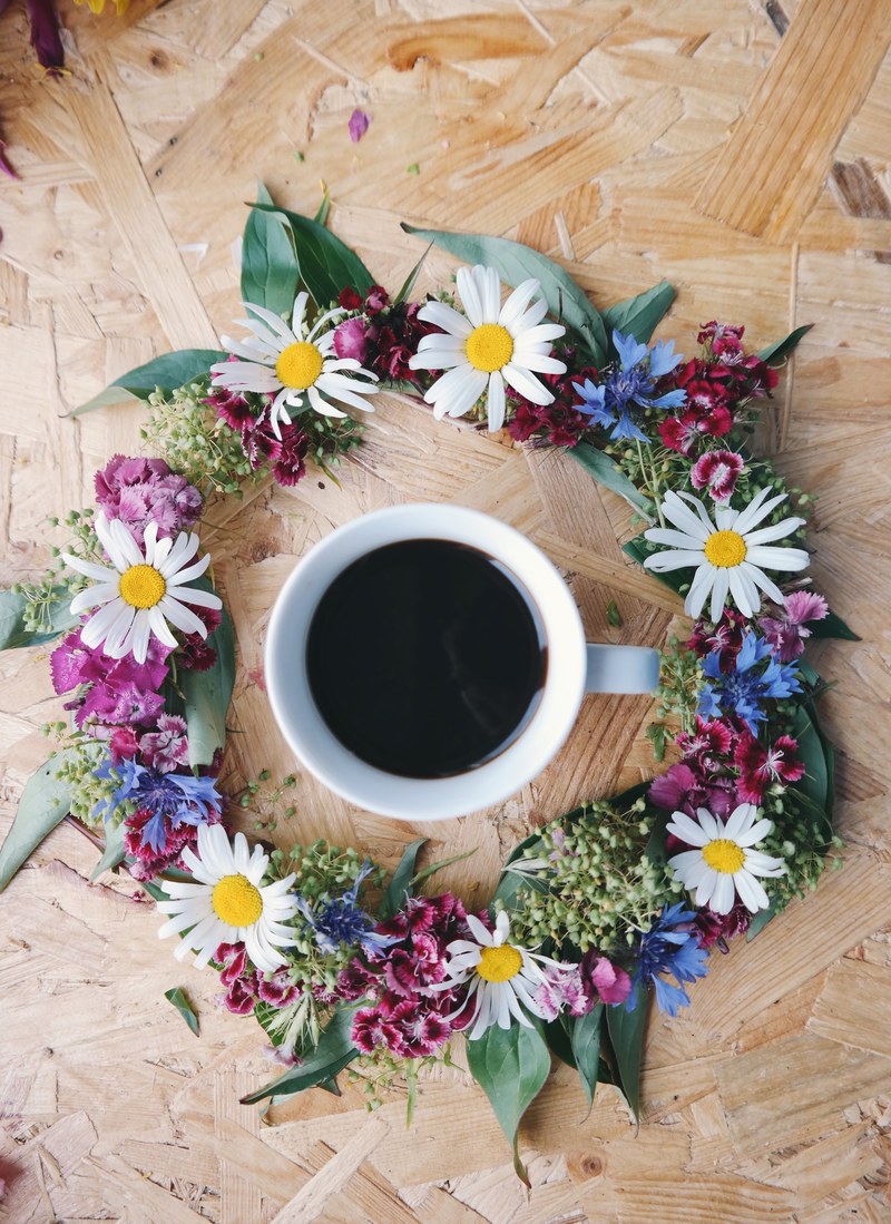 on the table drink cup of coffee and wildflower hd, 4k