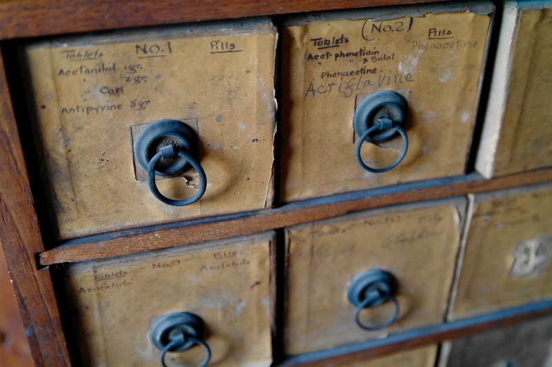 square drawers in an old cabinet used to store medicine, vintage medicine cabinet 4k