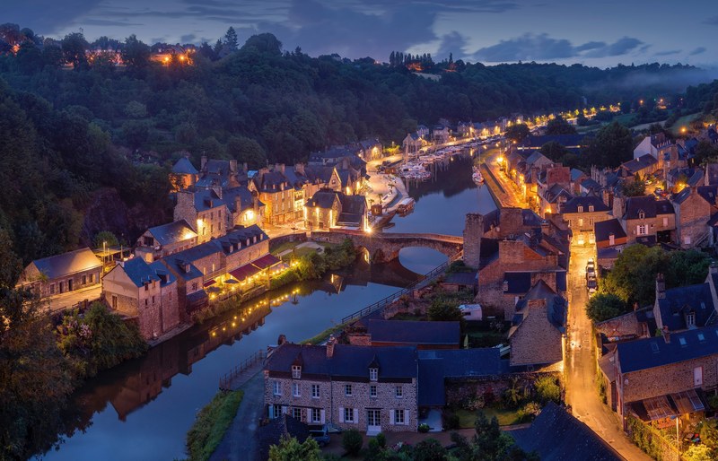aerial view of a charming european town on a small river, quaint river town 4k