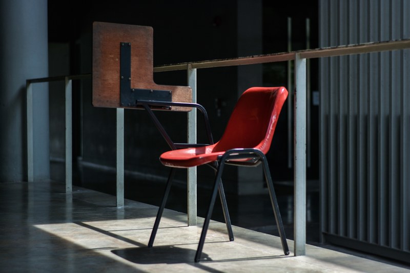 vintage office chair with desk top in a hallway, wonder chair 4k