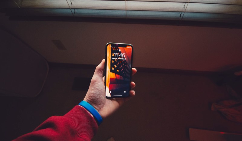 mobile phone hand holding and app developer 4k