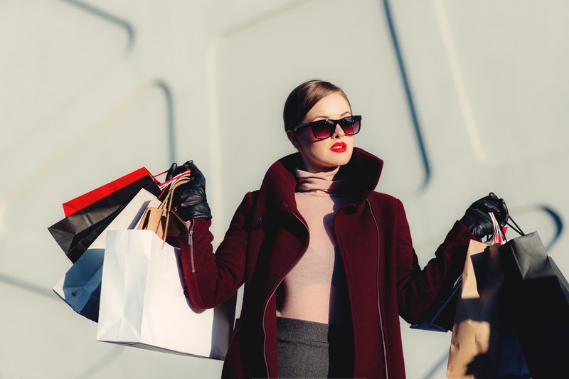 high fashion woman carries a handful of shopping bags, shopping freak 4k