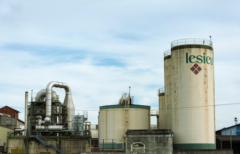 white rusted silos outside of a factory, silos at factory 4k