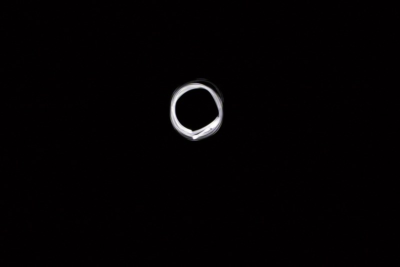 spiral of white light in black background, white light spiral 4k