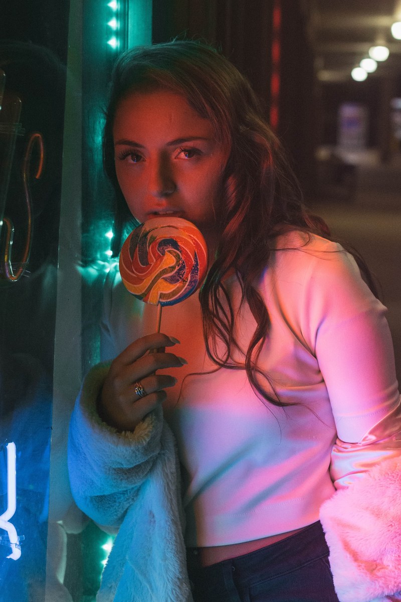 woman woman with lollipop portrait and neon light hd, 4k