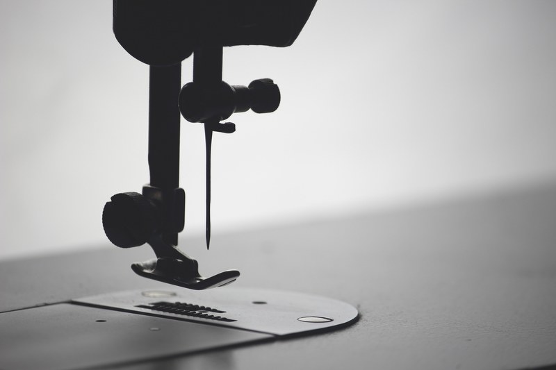 silhouette of foot and needle of sewing machine, sewing machine podolsk singer 4k