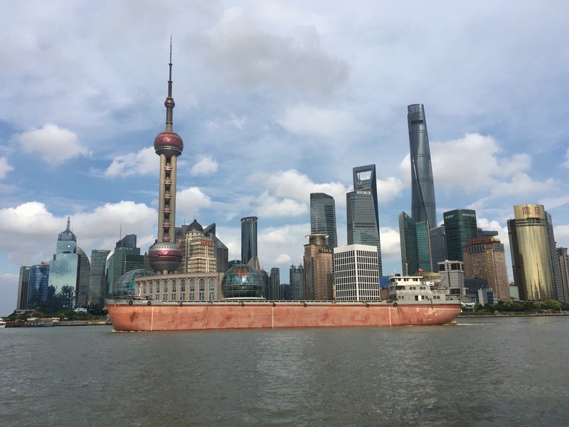 vessel in front of shanghai skyline 4k