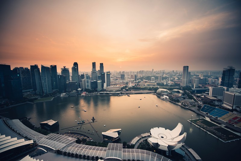 yachts in a marina in singapore in the evening, evening over singapore marina 4k