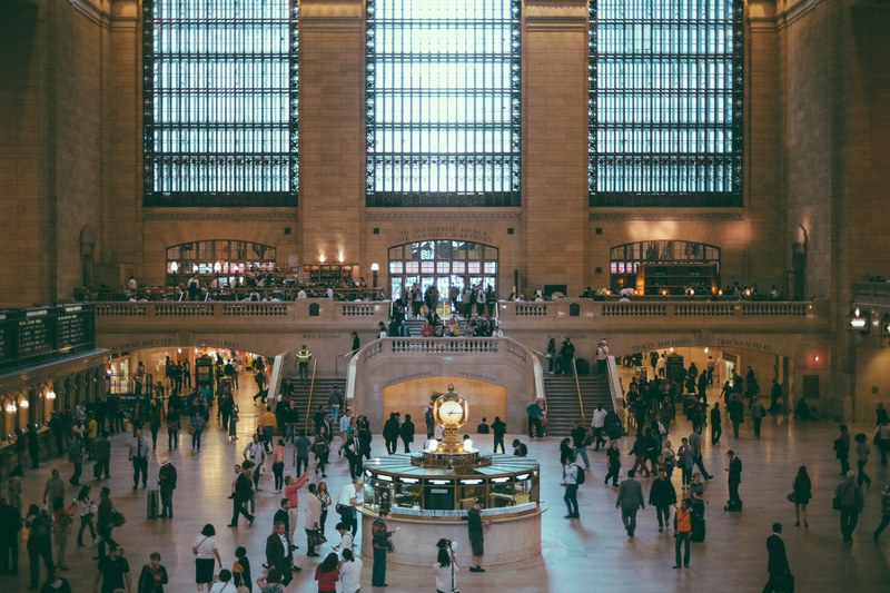 the crowded interior of grand central terminal in new york, travelers in the terminal 4k