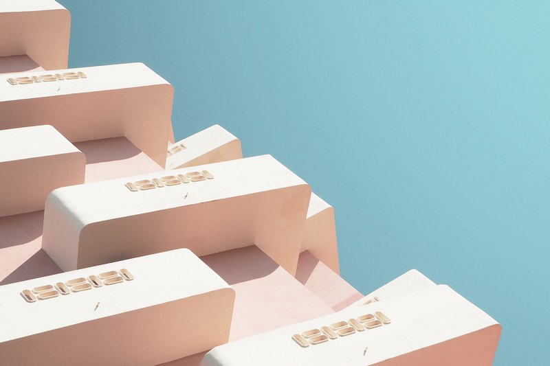 an angular shot of smooth white balconies on a building in almera spain, abstract architecture 4k