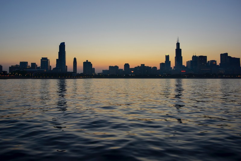 the skyline of chicago seen from the michigan lake at sunset, chicago from michigan lake 4k