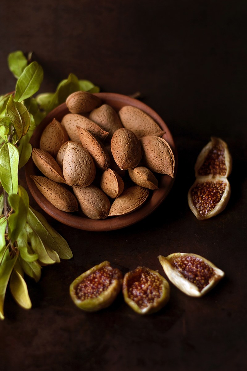 bowl of almonds by figs and fennel, nuts and fruit 4k