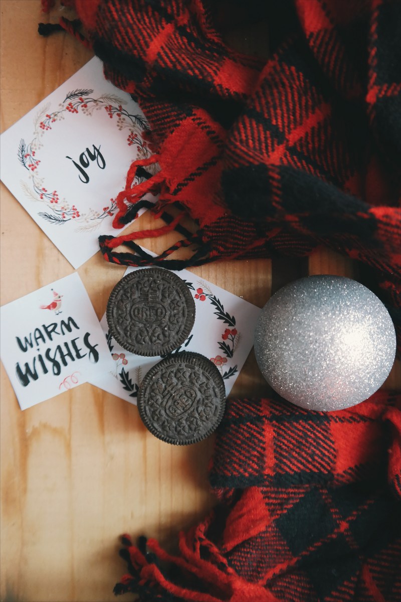 oreo cookies around christmas paper notes an ornament and red plaid fabric, _oreo cookies xmas flatlay 4k