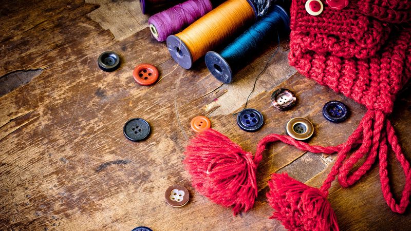 symbolism, sewing, thread, buttons, wooden background, 4k