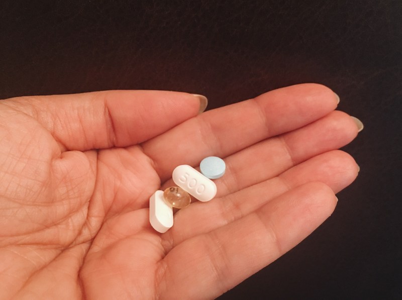 hand holding pills and tablets 4k