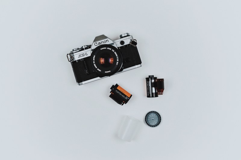 flat lay of photographers camera film and tools, developing film 4k