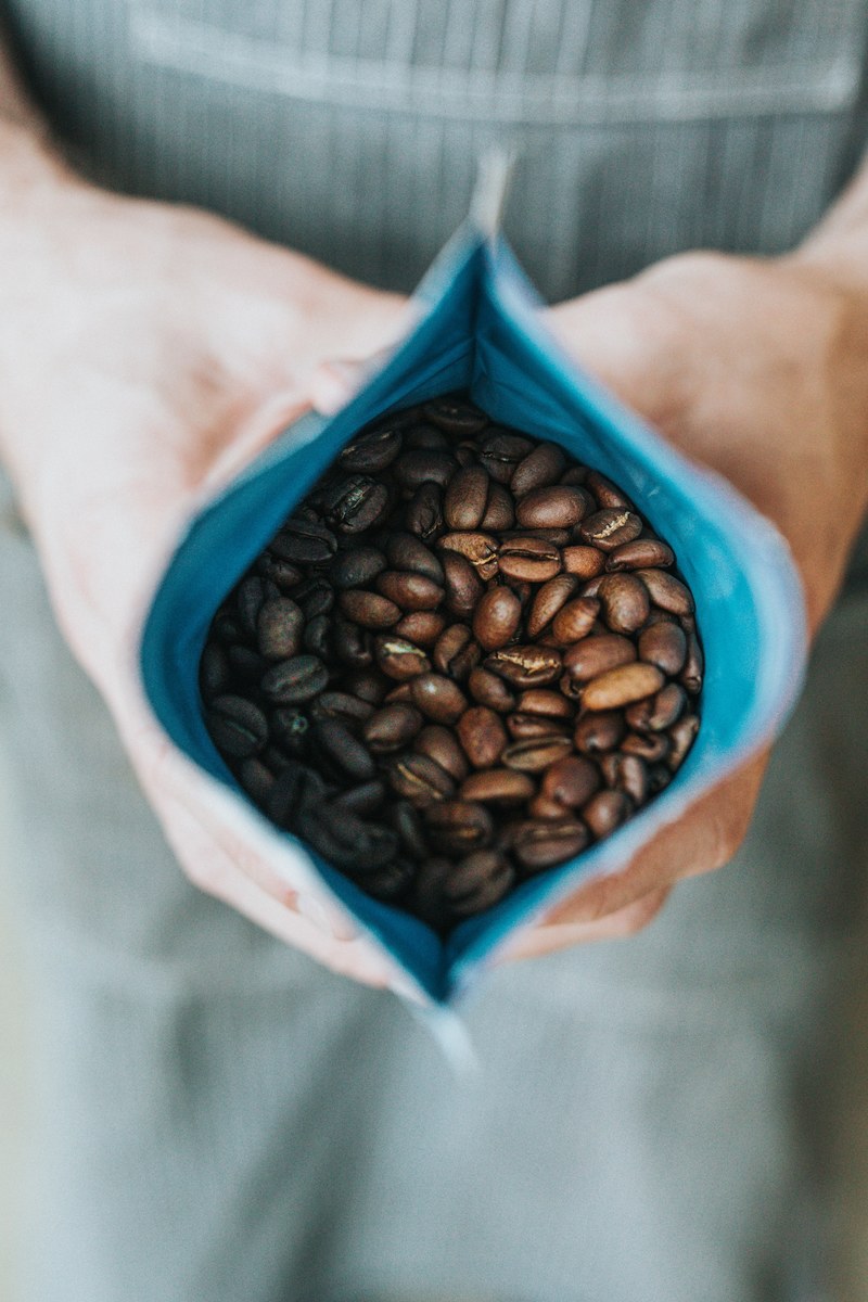 coffee bean brown packet and hand hd, 4k