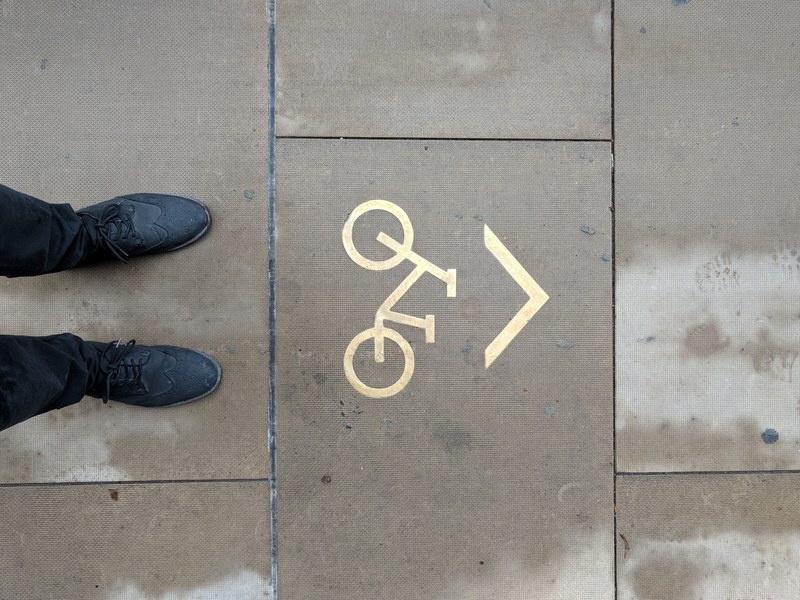 pavement sidewalk arrow and bike 4k