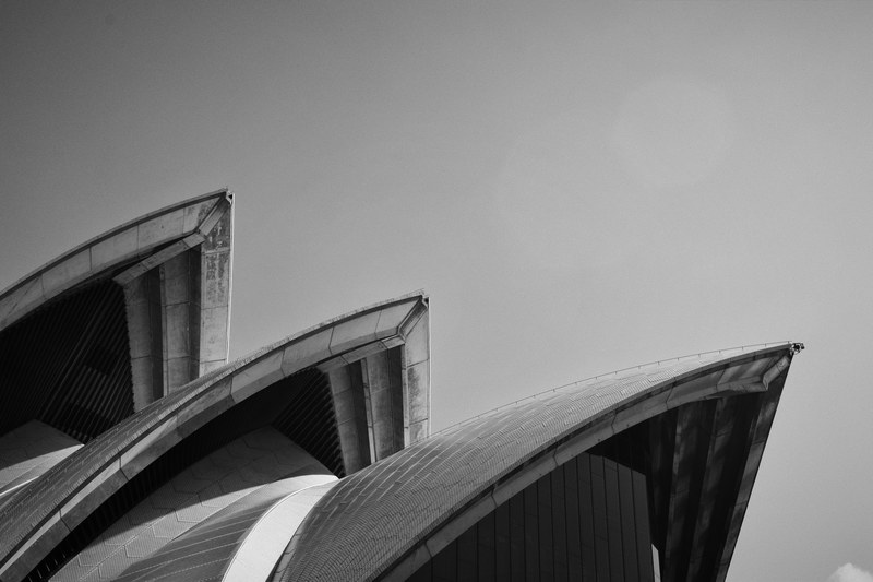 black and white shot of sydney opera house roof architecture with clear sky, the seashells of the sydney opera house 4k