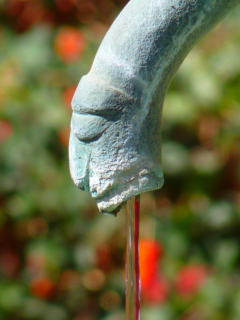 water feature fountain figure gargoyle water flow 4k