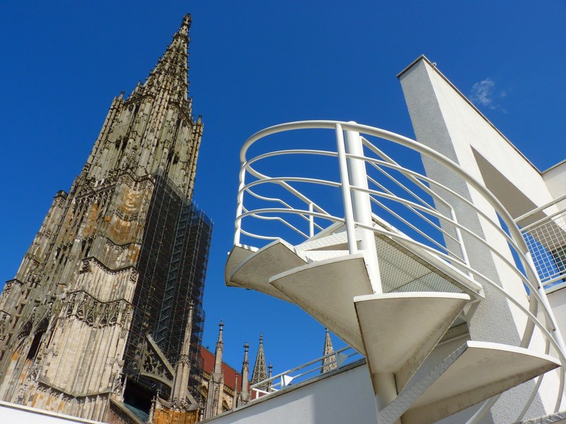 ulm cathedral building church head blue sky 4k
