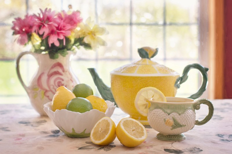 tea with lemon still life tea pot flowers in pitcher 4k