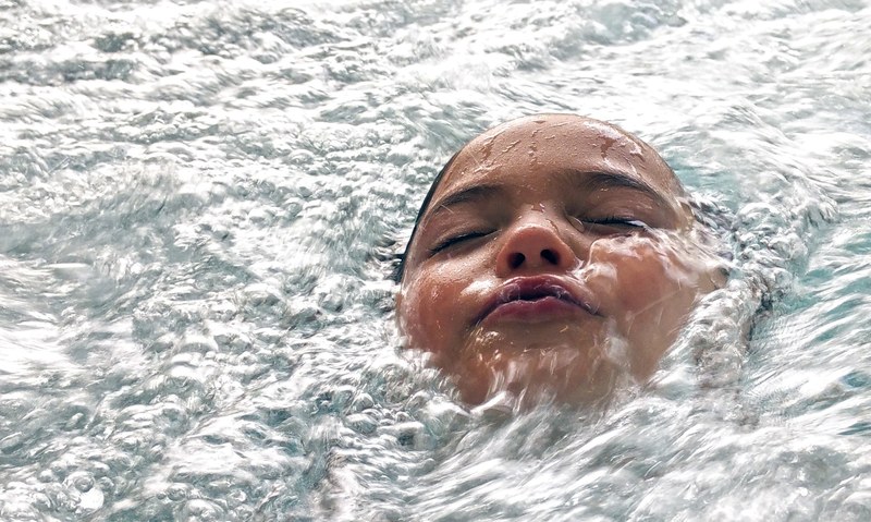 swimming pool water close up girl swimming child 4k