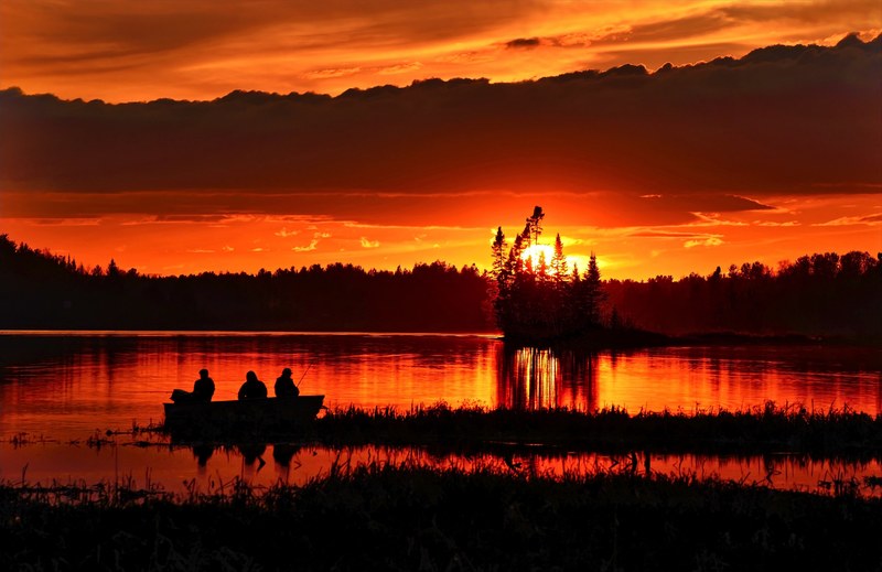 sunset evening twilight fishermen clouds sky lake 4k