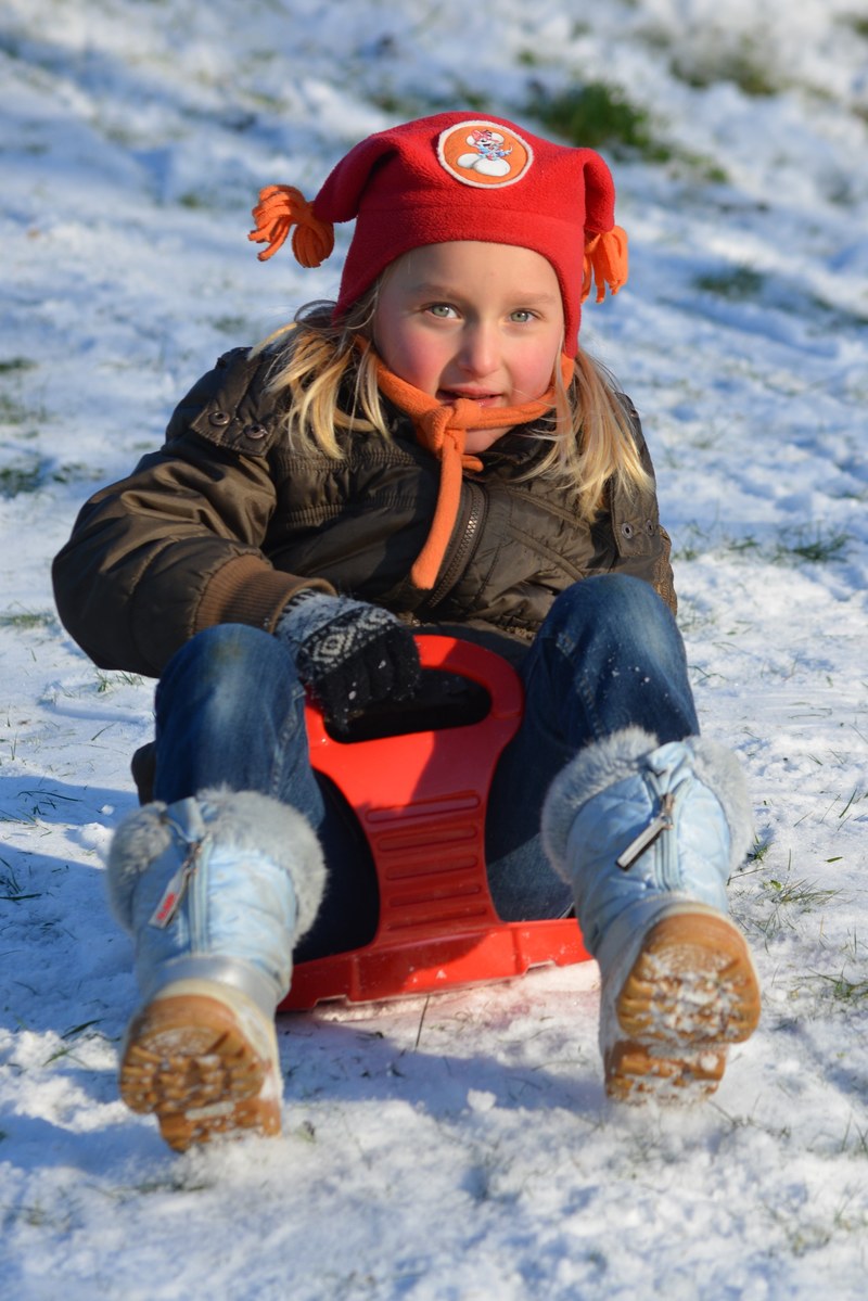 sled child snow people girl hat winter fun 4k