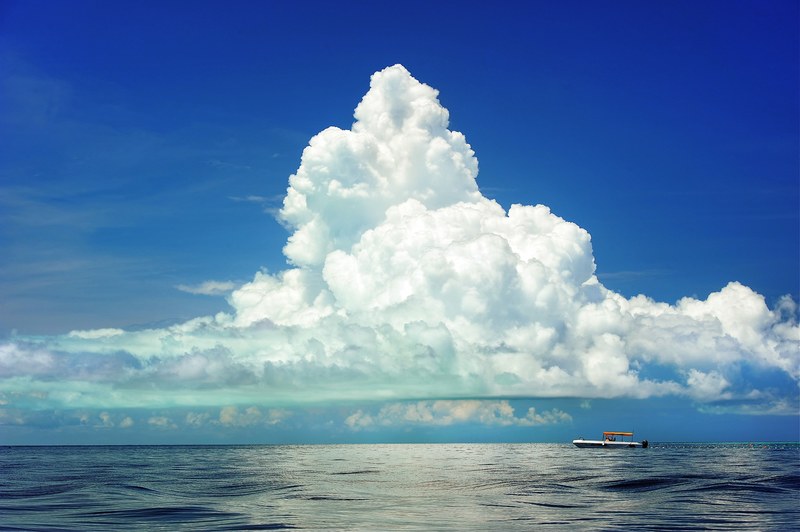 sea boat clouds cumulous marine ocean travel sky 4k