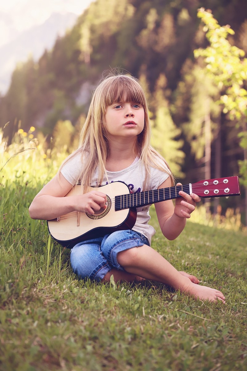 person human child girl blond guitar music 4k