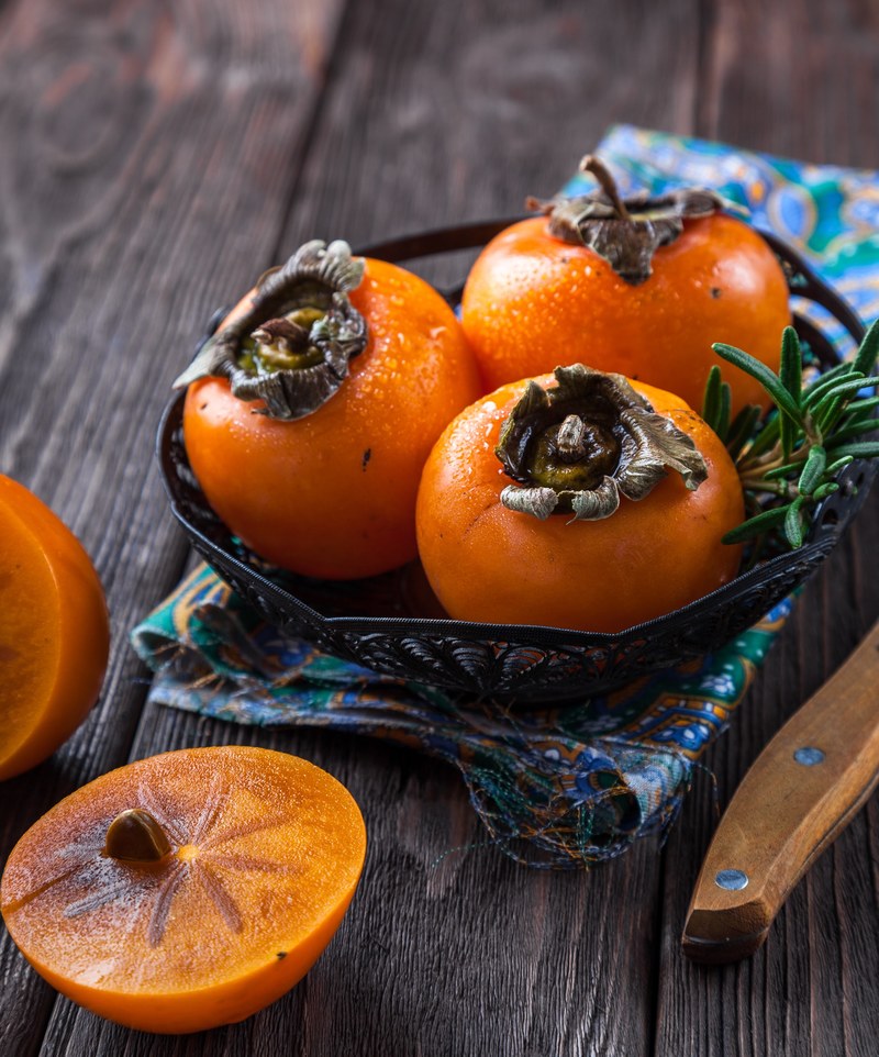 persimmon fruit orange table the willow wren 4k
