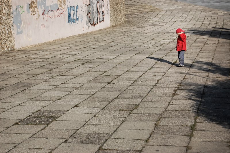 lonely boy child red a small child a person city 4k