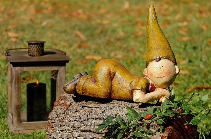 imp figure males lying log funny nature spirits 4k
