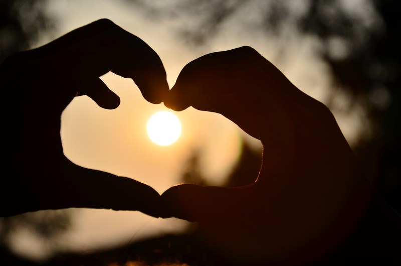 heart warm light and shadow beautiful hand icon 4k