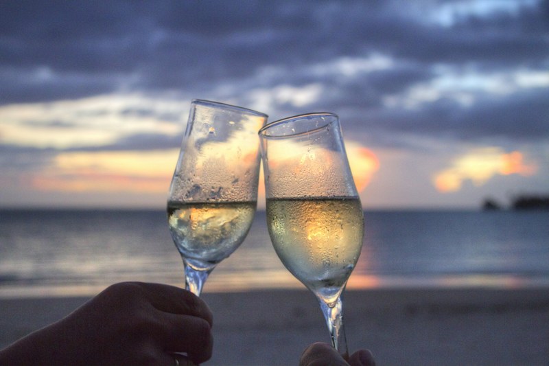 glasses sparkling wine cheers sun set evening 4k