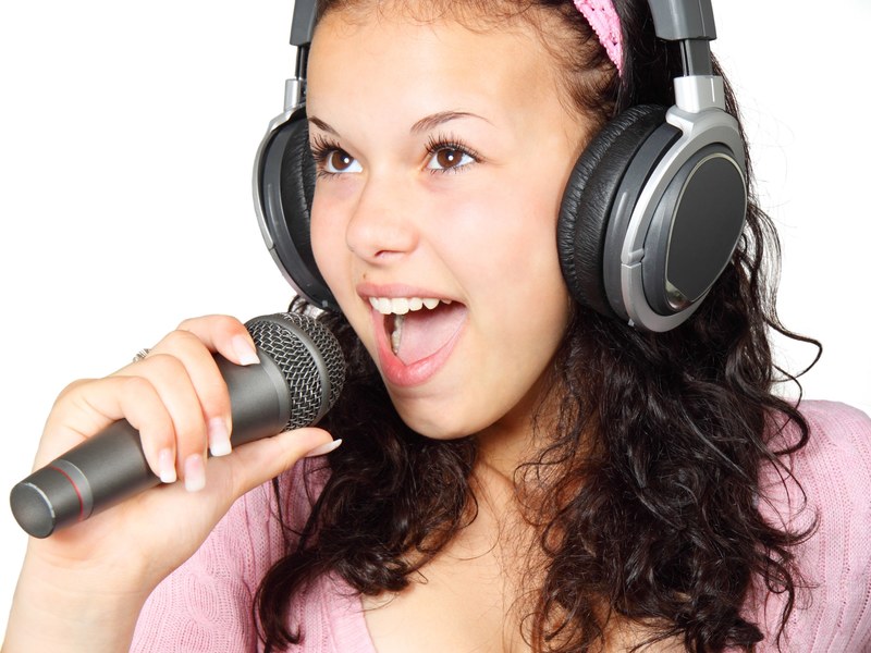 girl holding karaoke mic microphone music singer 4k