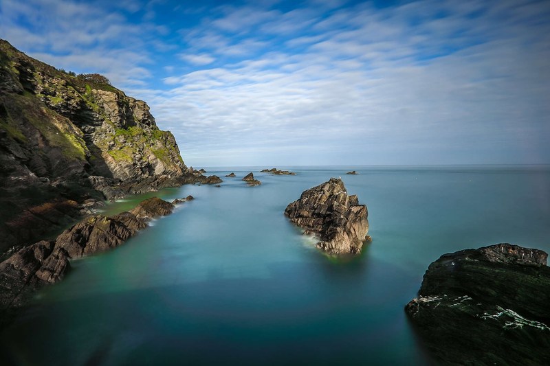 coast reefs rocks ocean england 4k