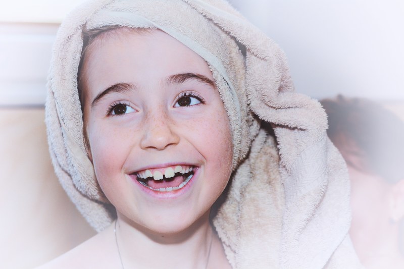 child girl face towel laugh portrait close 4k