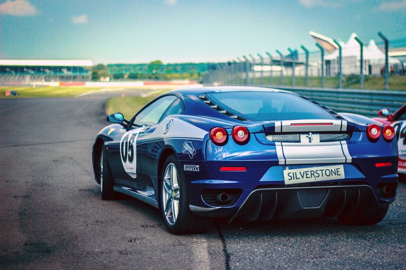 car race ferrari racing car pirelli speed blue 4k