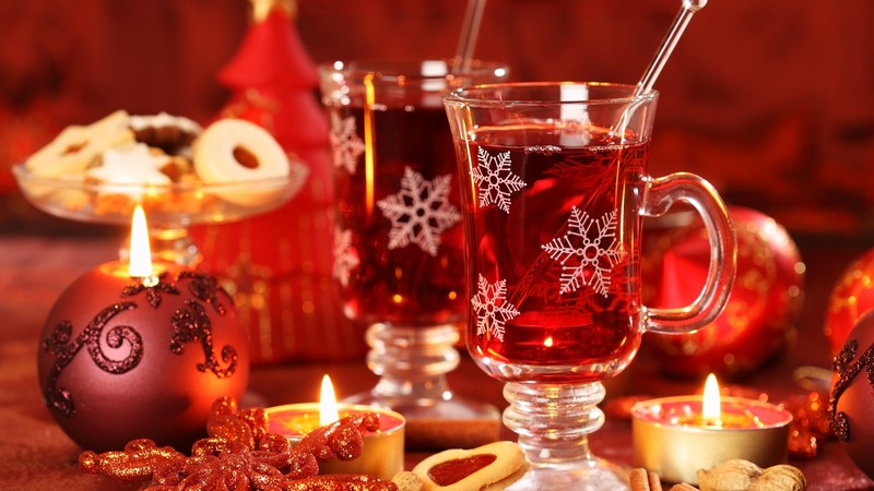 Mulled wine, candle, biscuits, cinnamon, decorations, peanuts, Christmas
