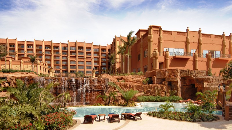 Kampala Serena, Uganda, Hotel, resort, pool, water, sunbed, waterfall, orange, travel, vacation, booking